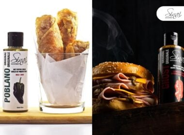 Two side-by-side images: on the left, a glass with fried egg rolls and a bottle of Sinai Poblano sauce; on the right, a cheeseburger beside a bottle of Sinai Ghost sauce, with smoke rising in the background.