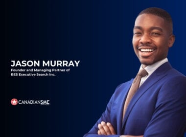 A smiling man in a blue suit stands with arms crossed against a dark blue background. Text reads, “Jason Murray, Founder and Managing Partner of BES Executive Search Inc.” with the CANADIANSME logo below.