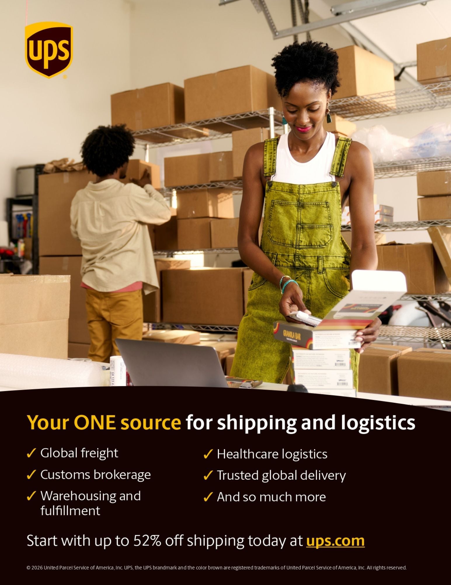 Two people pack cardboard boxes in a warehouse. A woman in a green apron scans a package, while another person works in the background. Text promotes UPS shipping and logistics services with a laptop and boxes visible.
