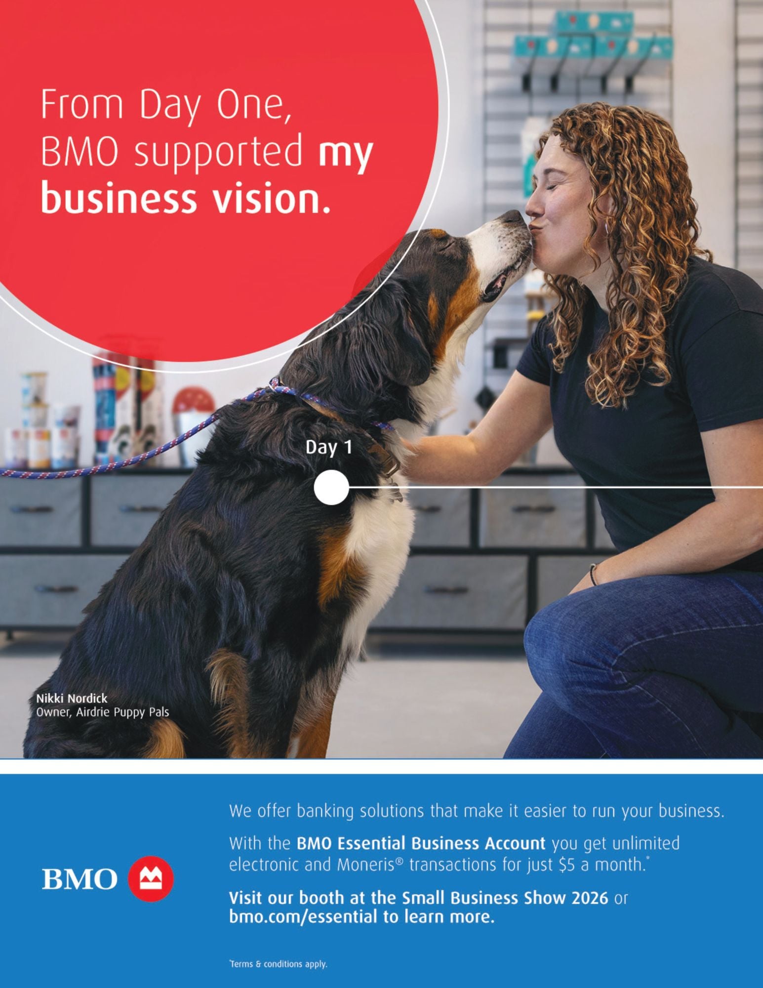 A woman with curly hair kisses a large black, brown, and white dog on the nose. The text reads, “From Day One, BMO supported my business vision.” BMO banking details and logos are shown at the bottom.