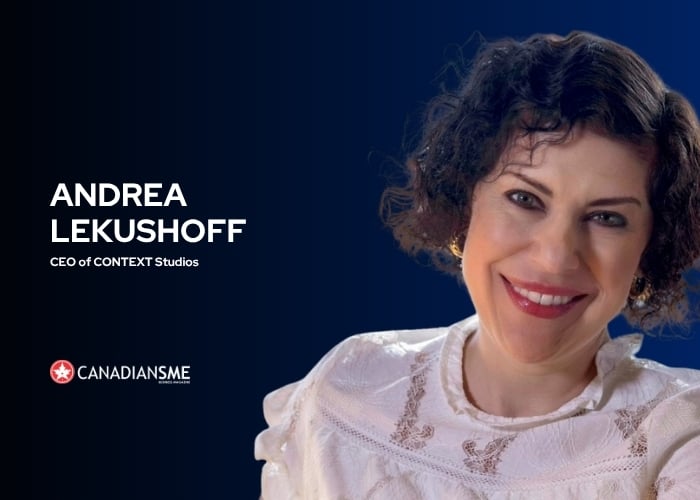 A woman with short, curly dark hair and a white lace top smiles at the camera against a blue background. Text reads: “Andrea Lekushoff, CEO of CONTEXT Studios and includes a CanadianSME logo.