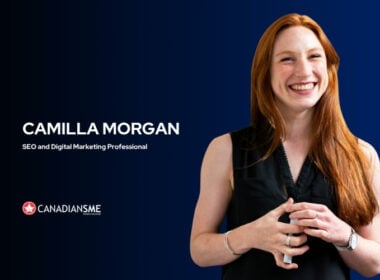 A woman with long red hair smiles while standing against a dark blue background. Text reads Camilla Morgan, SEO and Digital Marketing Professional with the CanadianSME logo below.
