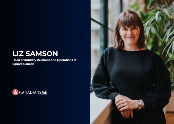 A woman with shoulder-length brown hair and bangs, wearing a black top, stands by a window and smiles. On the left, text reads: Liz Samson, Head of Industry Relations and Operations at Square Canada.